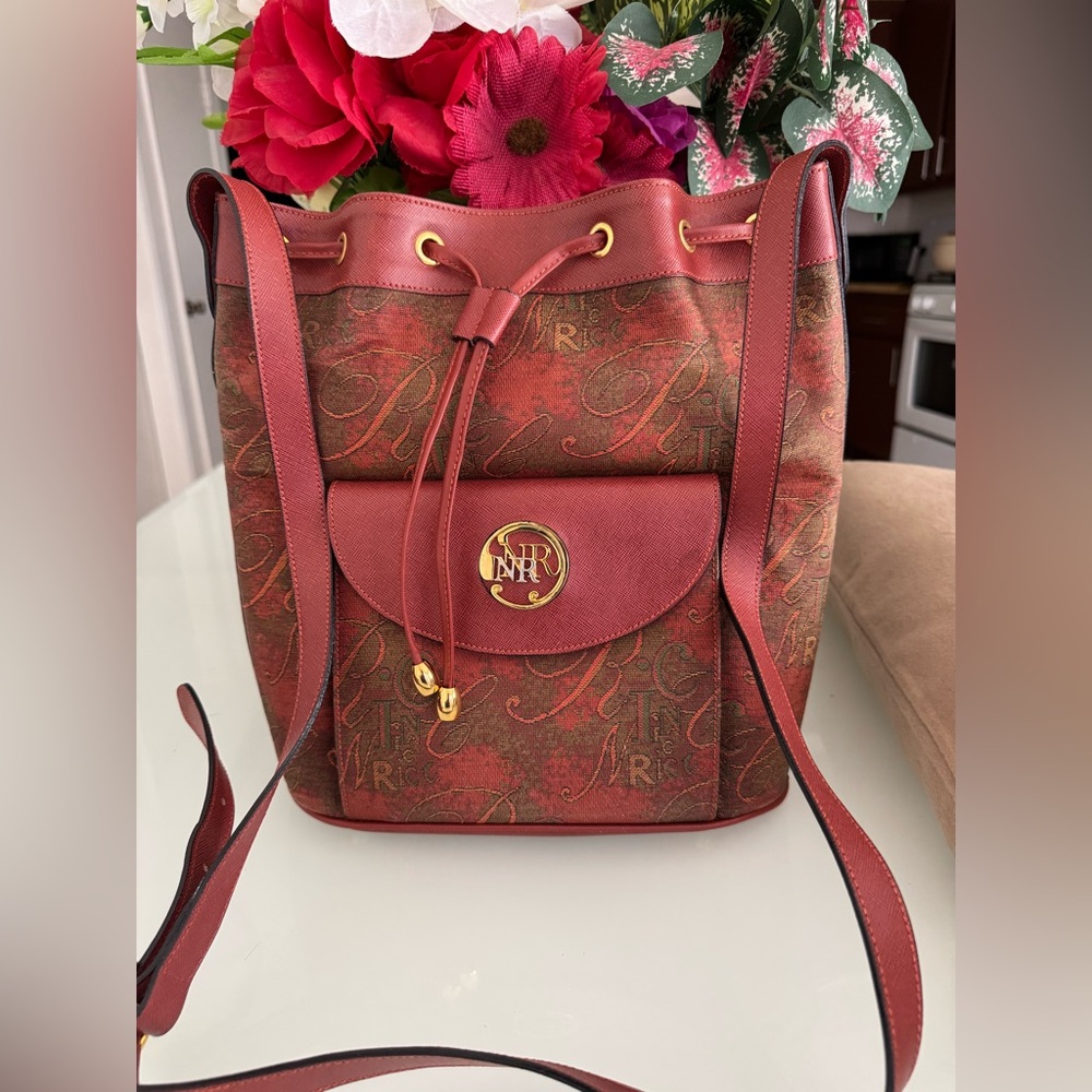 NWOT Nina Ricci Bucket crossbody Bag. Very rare
